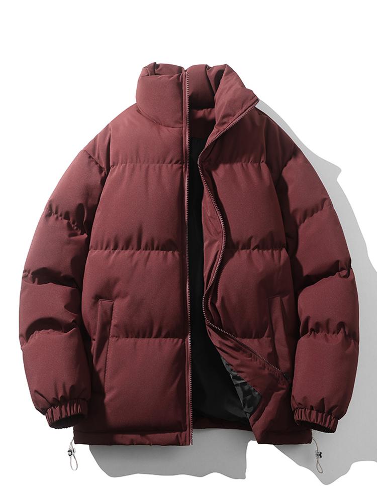 Men's lightweight black quilted puffer jacket with secure zip closure and adjustable hem