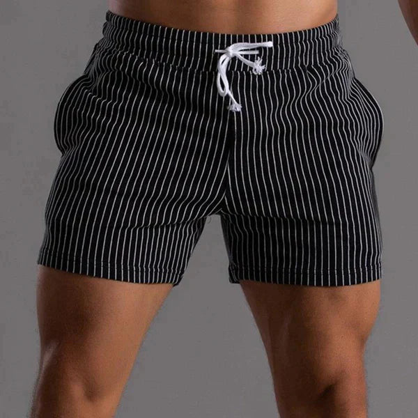 Men's quick-dry swim shorts tailored fit mid-thigh silhouette with adjustable drawstring beachwear