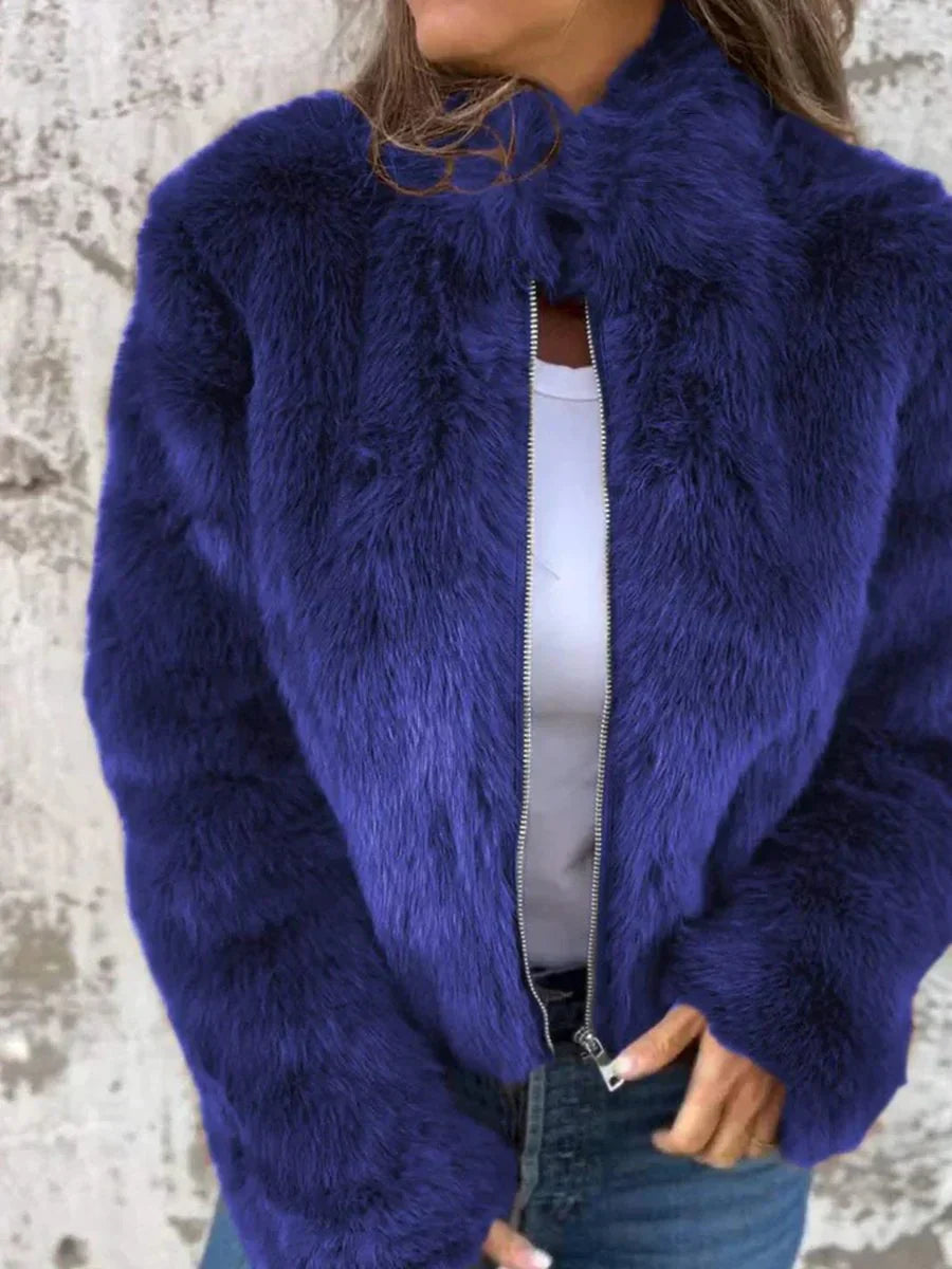 Women's elegant ivory fur coat with front zipper closure, luxurious warm sustainable outerwear