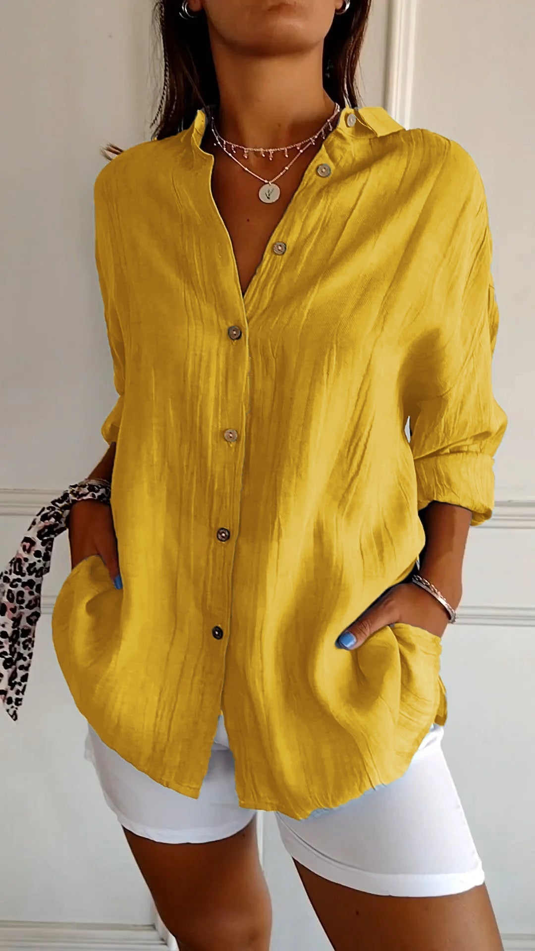 Lightweight women's button-down shirt in breathable cotton-polyester blend, classic office-ready silhouette