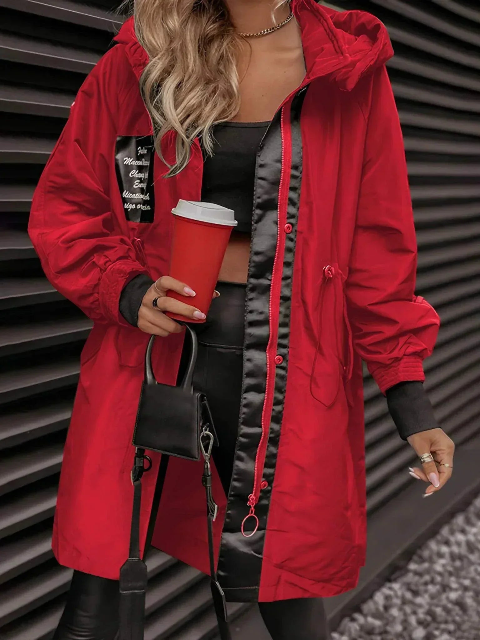 Women's black hooded jacket sleek silhouette with integrated hood for sustainable city style