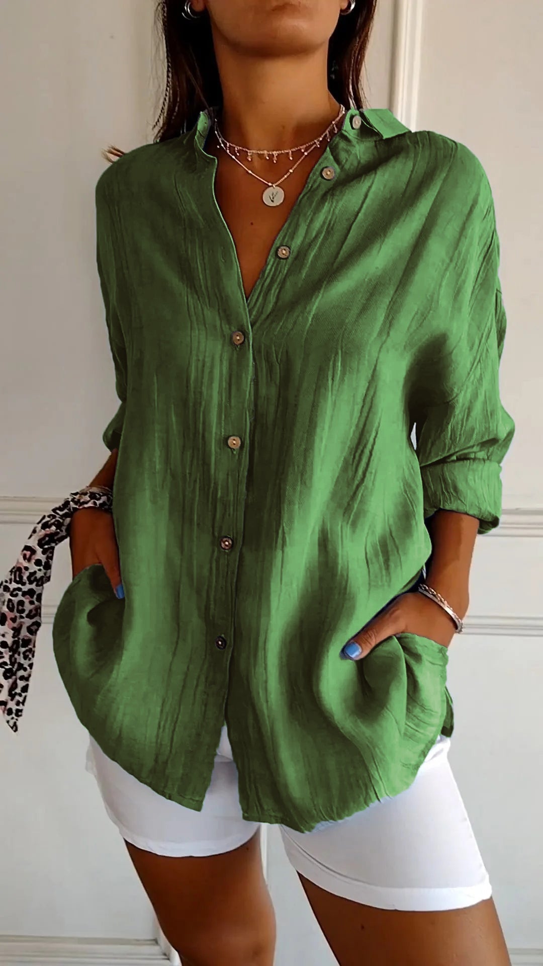 Lightweight women's button-down shirt in breathable cotton-polyester blend, classic fit for office and everyday wear