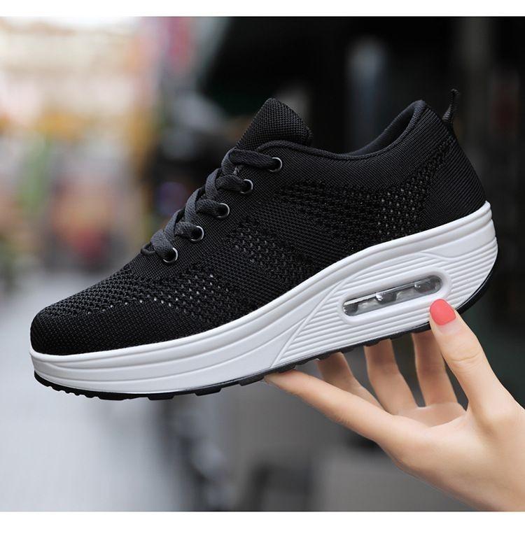 Women's white orthopedic sneakers with breathable mesh upper and posture-correcting sole support