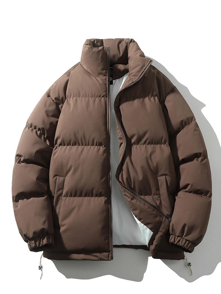 Men's lightweight black quilted puffer jacket with secure zip closure and adjustable hem