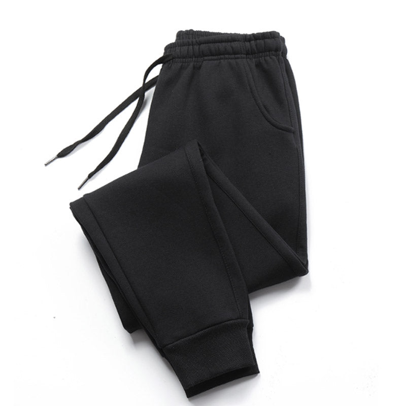 Men's gray casual jogger pants with elastic drawstring waistband and ribbed ankles for gym and street