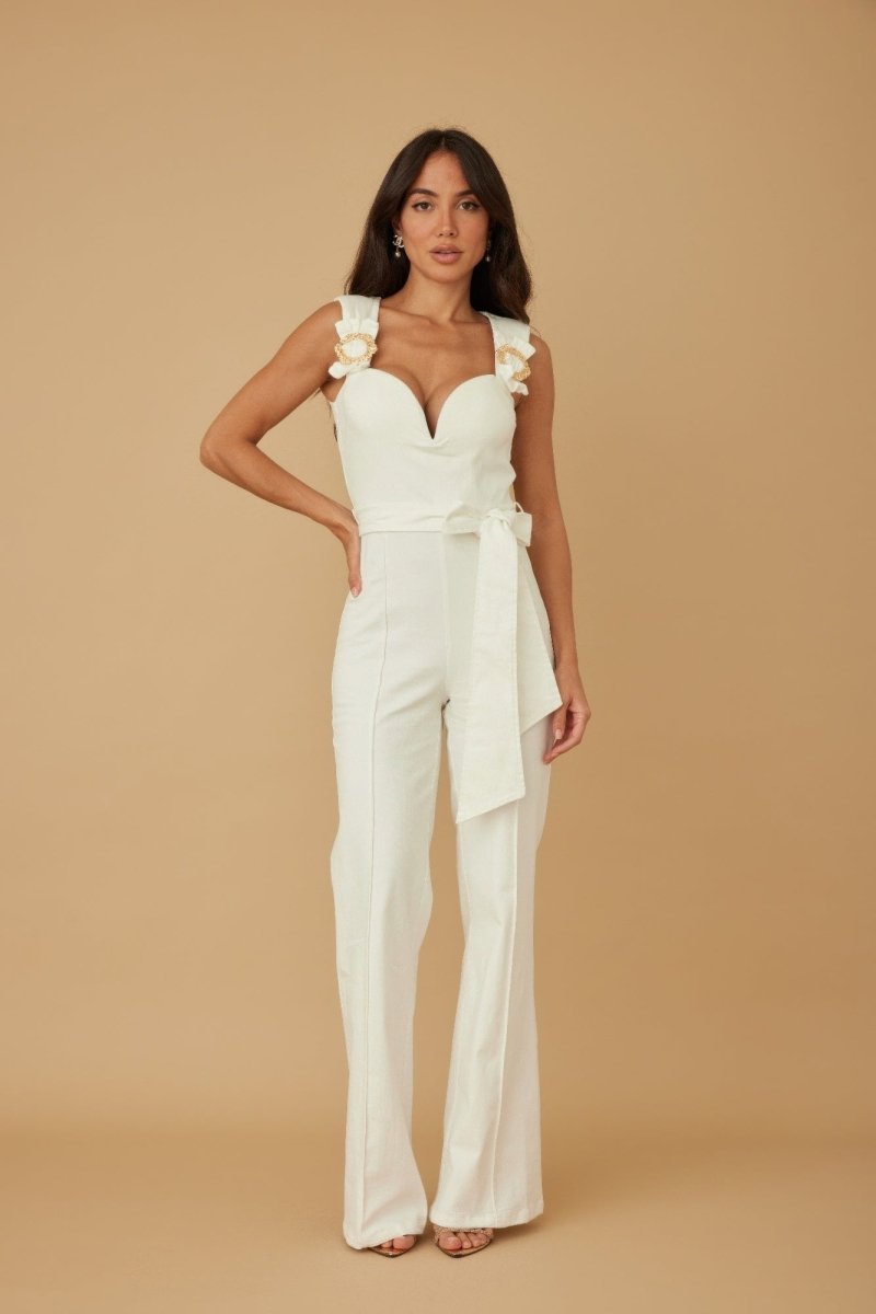 Women's black sleeveless jumpsuit rayon blend curved neckline intertwined ring strap sculptural silhouette