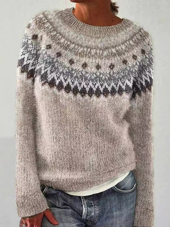 Women's luxury cashmere pullover sweater in soft neutral tones, elegant timeless silhouette for everyday wear