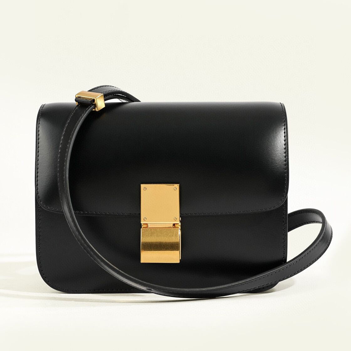 Women's genuine leather structured box shoulder bag vintage-inspired flap closure compact silhouette