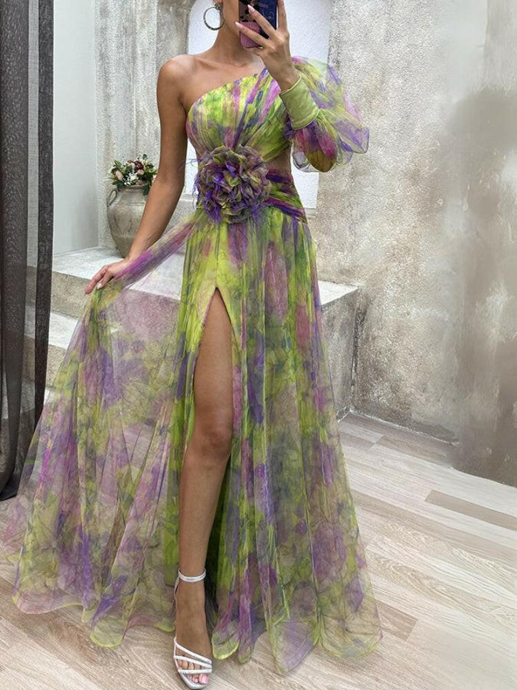 Floral maxi dress one-shoulder silhouette with rosette waist detail and flowing tulle skirt