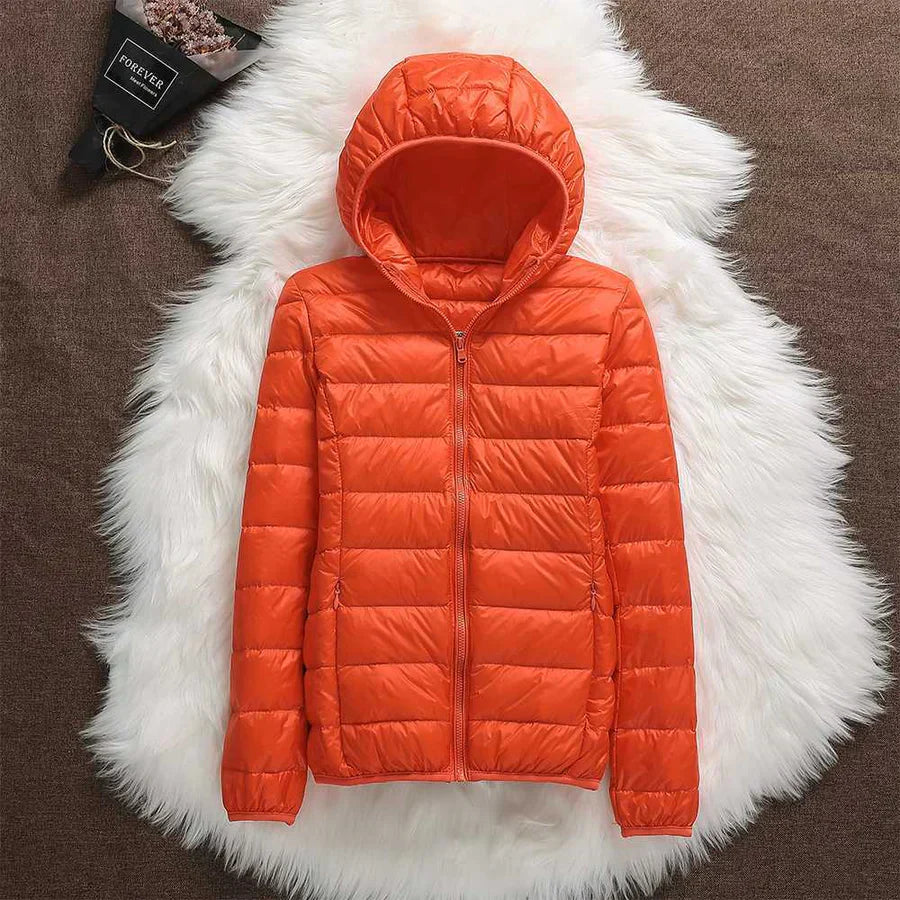 Briella weatherproof cozy jacket in neutral tones, relaxed outdoor fit with wind and rain resistant shell