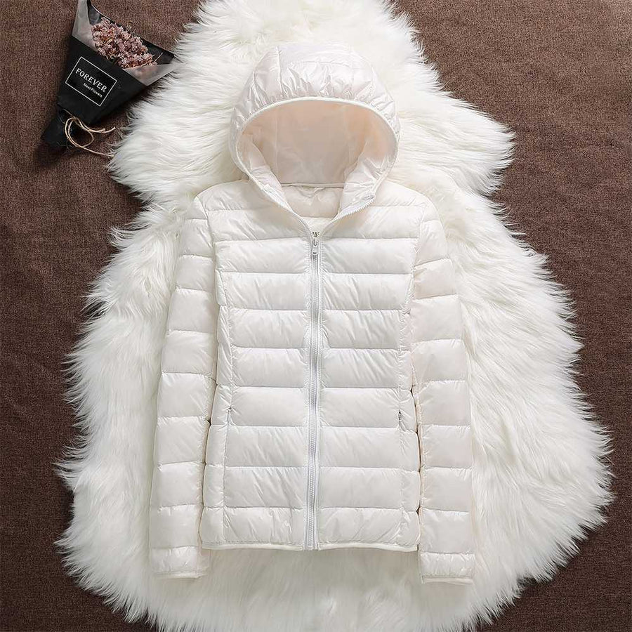 Briella weatherproof cozy jacket in neutral tone, relaxed outdoor fit with wind and rain resistant shell