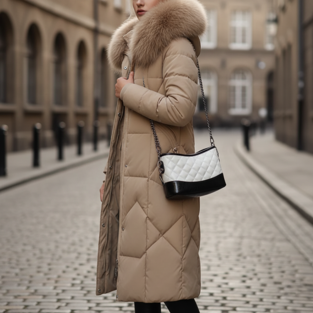 Women's black padded winter jacket with adjustable hood and plush fur collar for cozy all-weather style