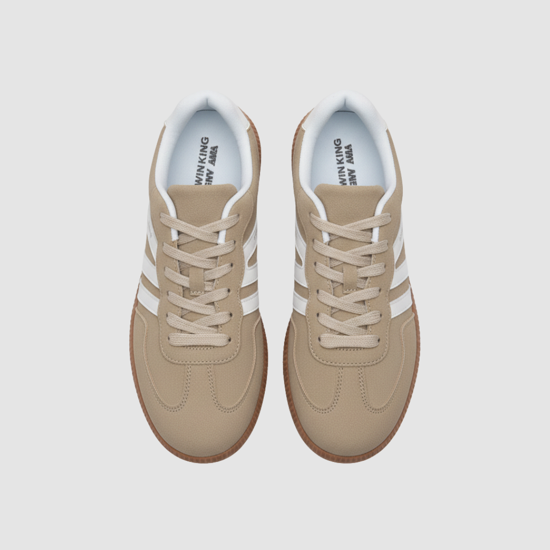 White women's lace-up sneakers with bold side stripes, cushioned rubber sole for everyday comfort