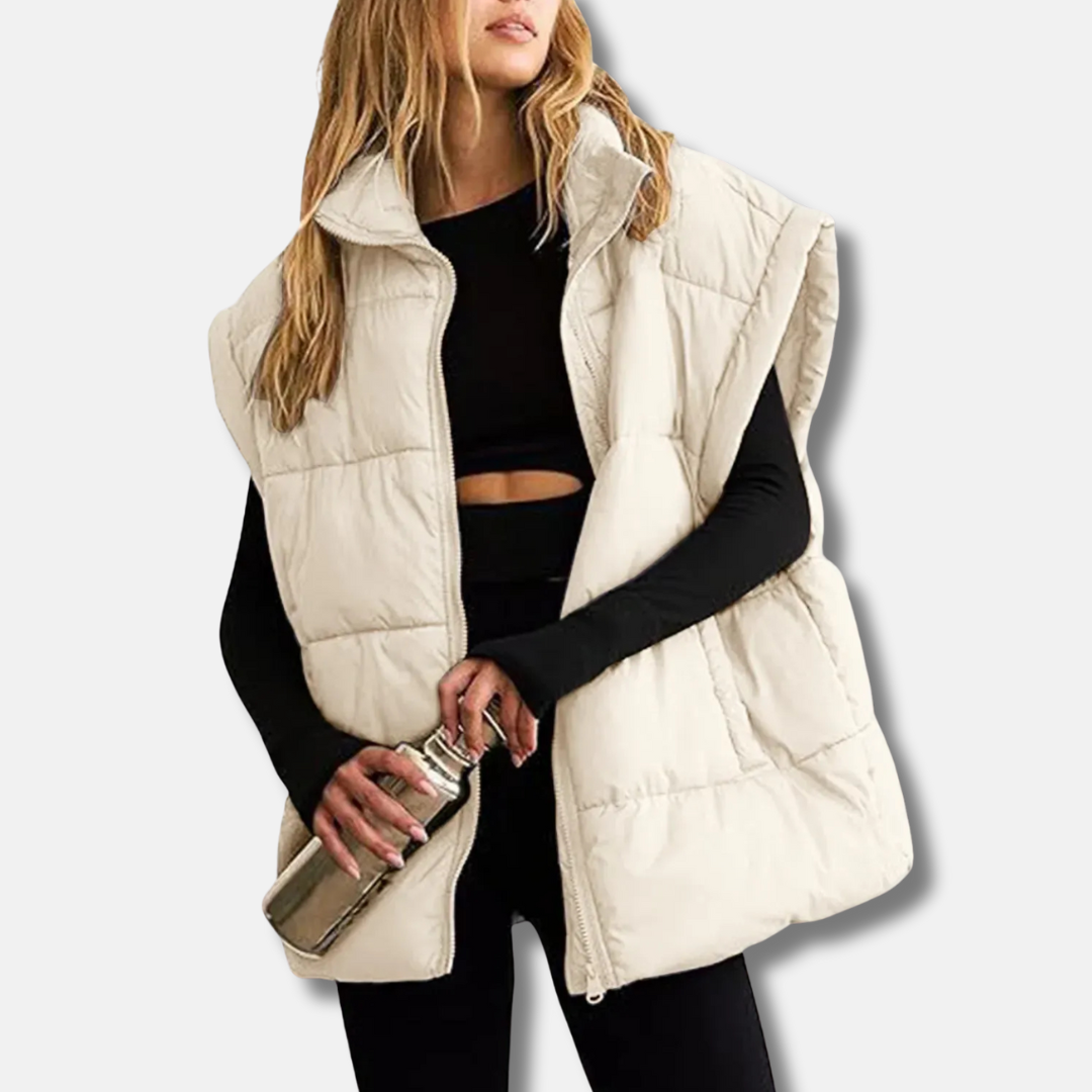 Women's quilted puffer vest stand collar hip-length warm layering essential in sleek versatile style