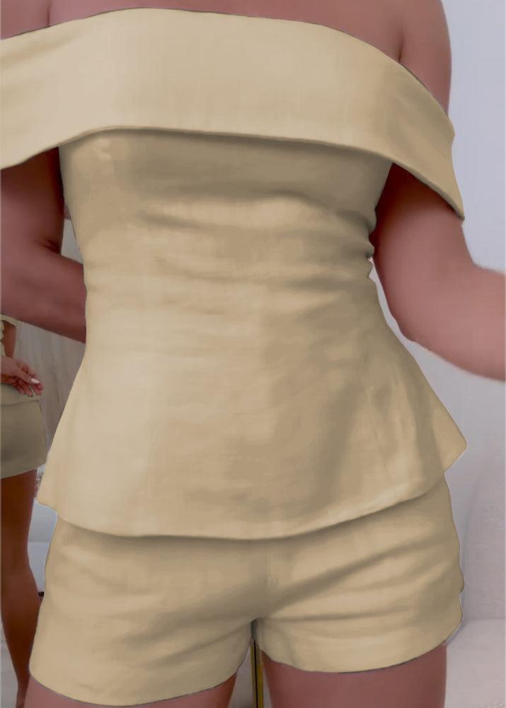 Women's white cotton blend two-piece suit with cropped button top and zipper closure tailored pants
