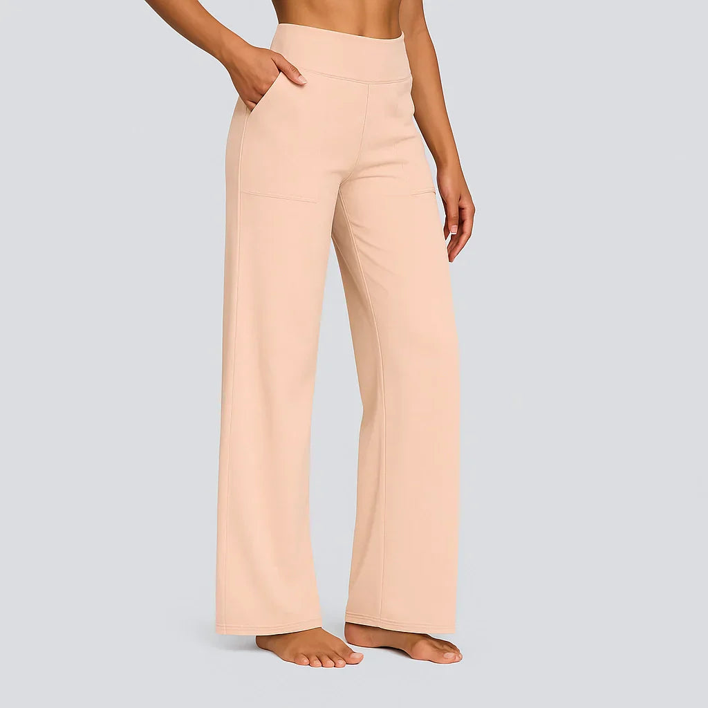 Women's black high-waist straight-leg performance pants with smooth sculpting waistband