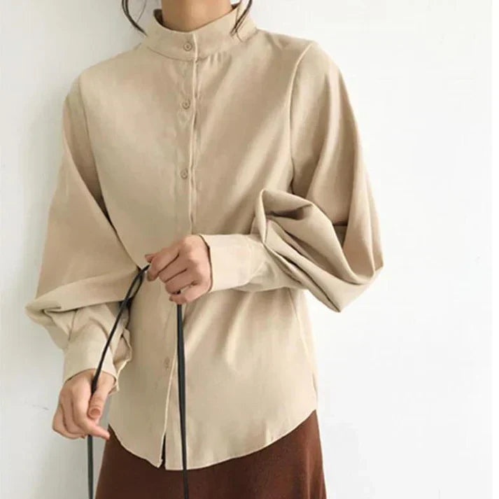 Women's white turtleneck blouse balloon sleeves fitted office wear timeless elegant silhouette