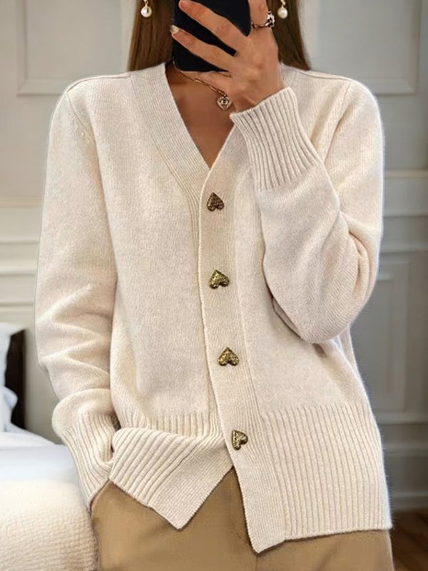 Women's thick knit V-neck cardigan in vintage preppy style, warm cozy wool blend with elegant silhouette