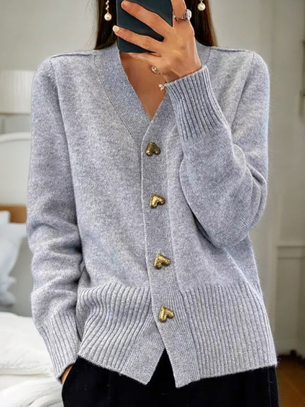 Women's thick knit V-neck cardigan in vintage preppy style with cozy wool blend and elegant silhouette