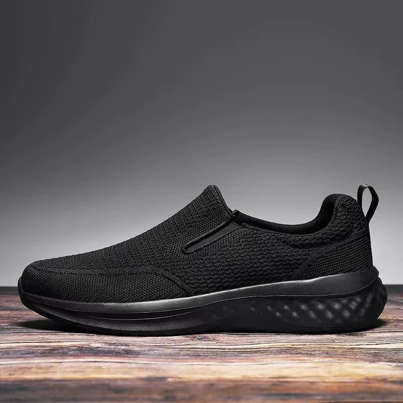 Gray slip-on running sneakers with breathable knit upper and cloud cushion EVA sole for all-day comfort