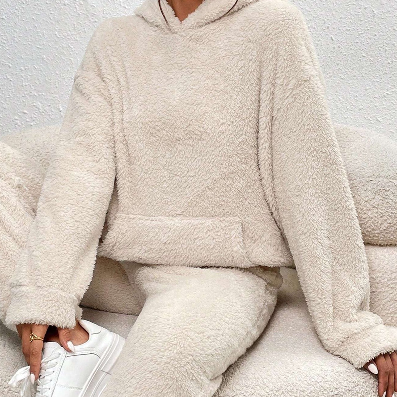 Women's soft plush two-piece lounge set in cozy matching top-and-bottom relaxed fit style