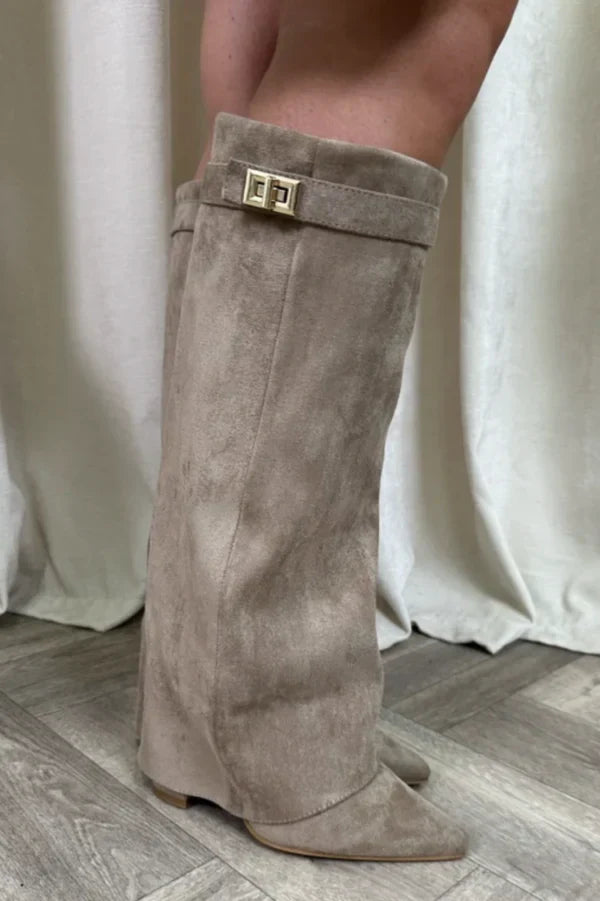Black knee-high wedge boots for women with structured fit and supportive elevated sole