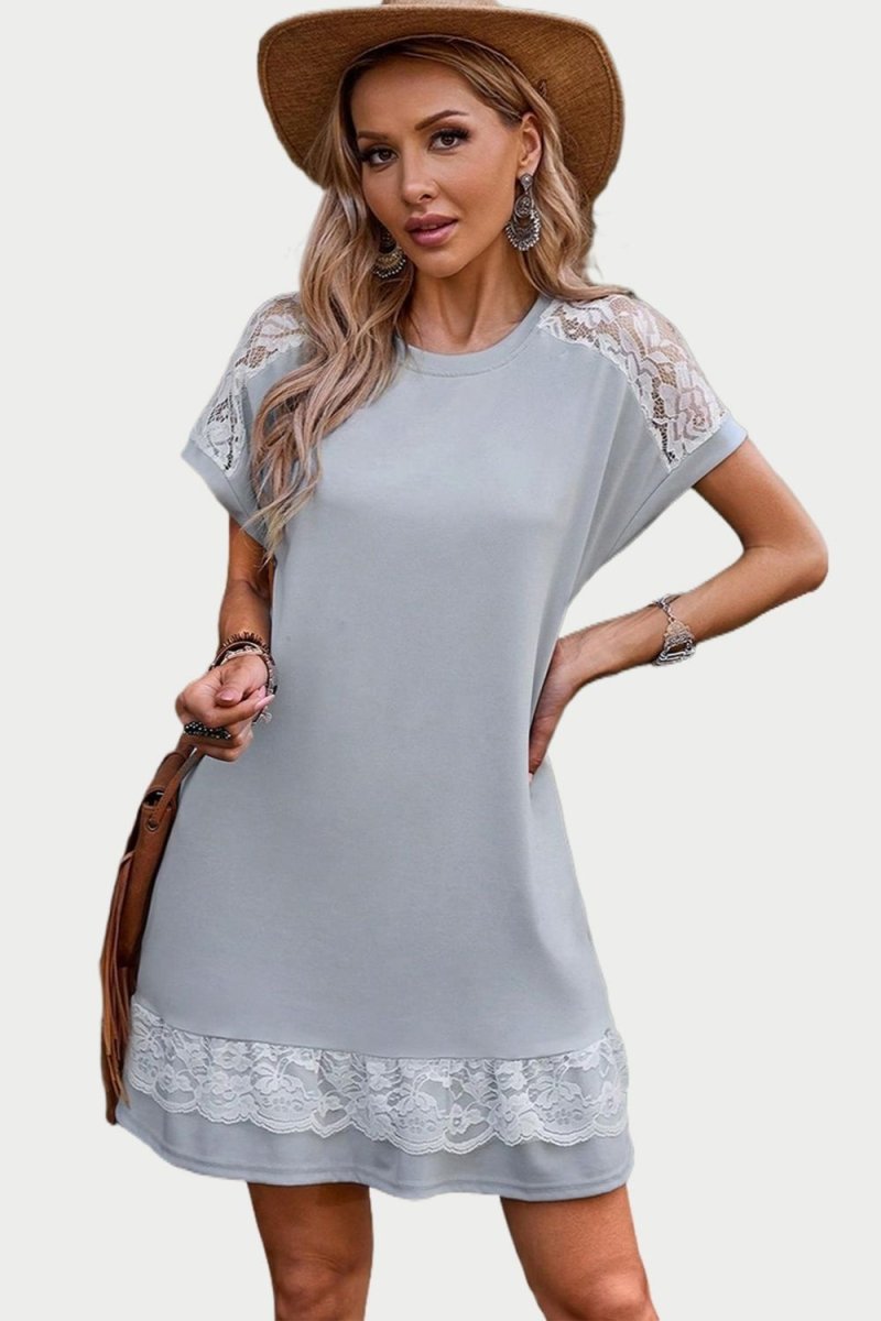 Women's romantic short sleeve dress with delicate lace neckline detail, versatile day-to-evening silhouette