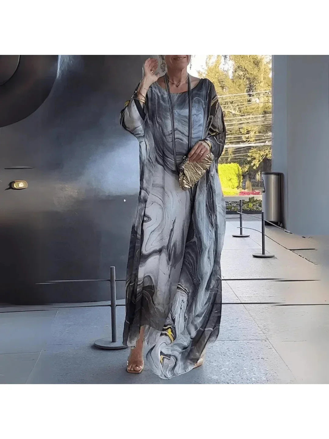 Women's flowing printed maxi dress relaxed ankle-length silhouette lightweight fluid drape warm-weather