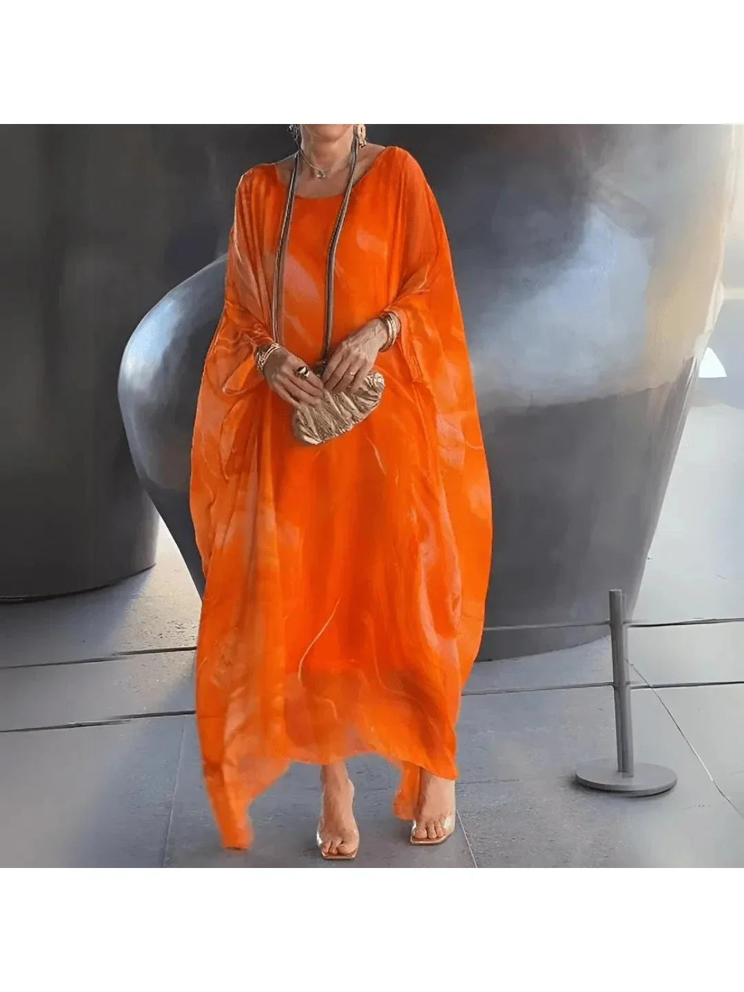 Women's flowing printed maxi dress relaxed ankle-length silhouette lightweight fluid drape warm weather