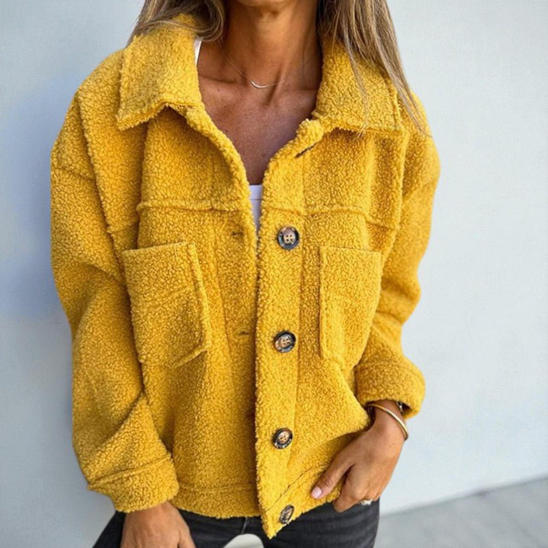 Lea loose-fit wool jacket with button closure, chest pockets, and soft lining for everyday wear