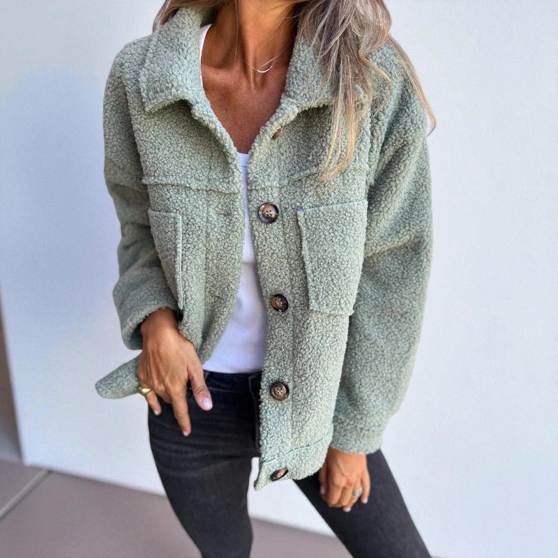 Lea loose-fit wool jacket with button closure, chest pockets, and soft lining for everyday wear