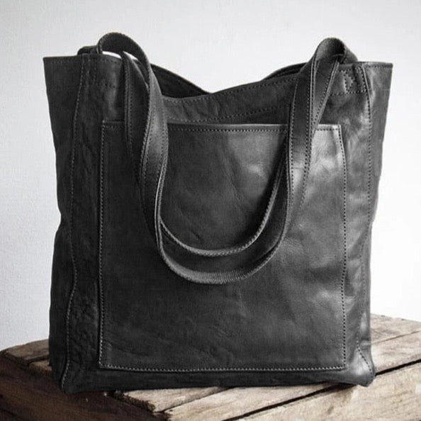 Premium genuine leather shoulder bag for women, spacious handcrafted carryall with timeless silhouette