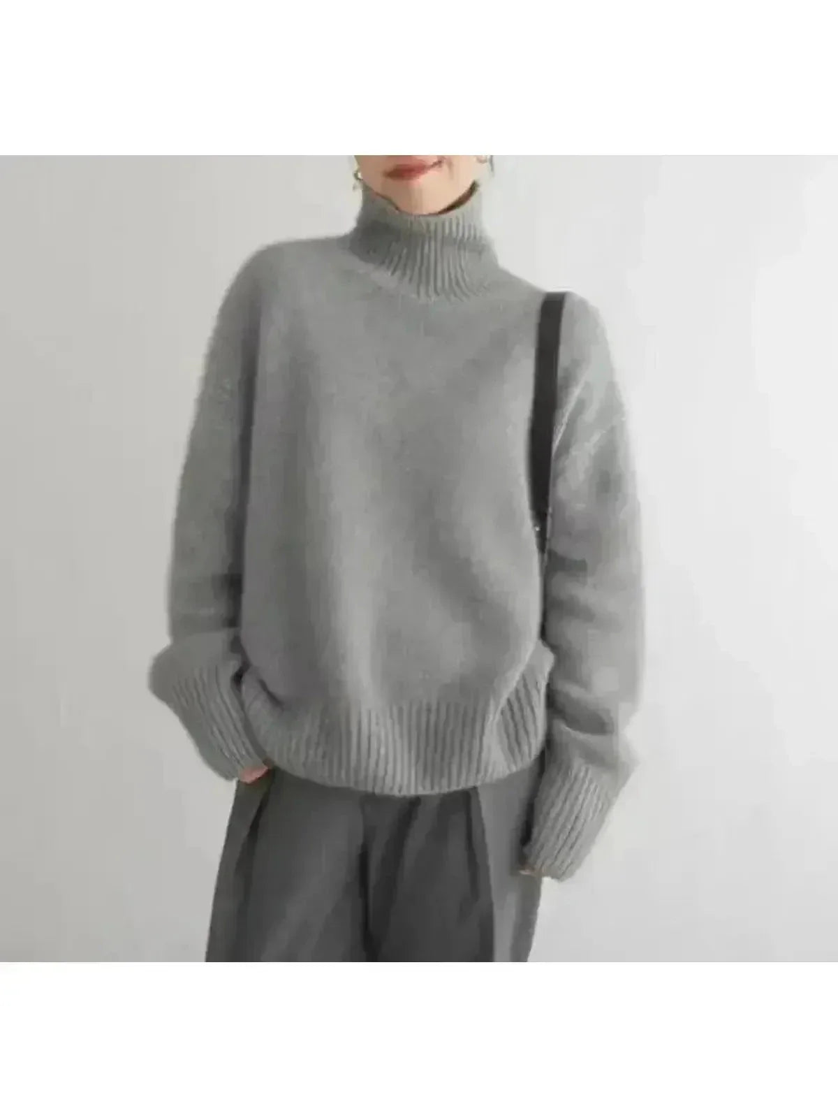 Women's beige premium knit turtleneck sweater, classic cozy fit with refined ribbed collar