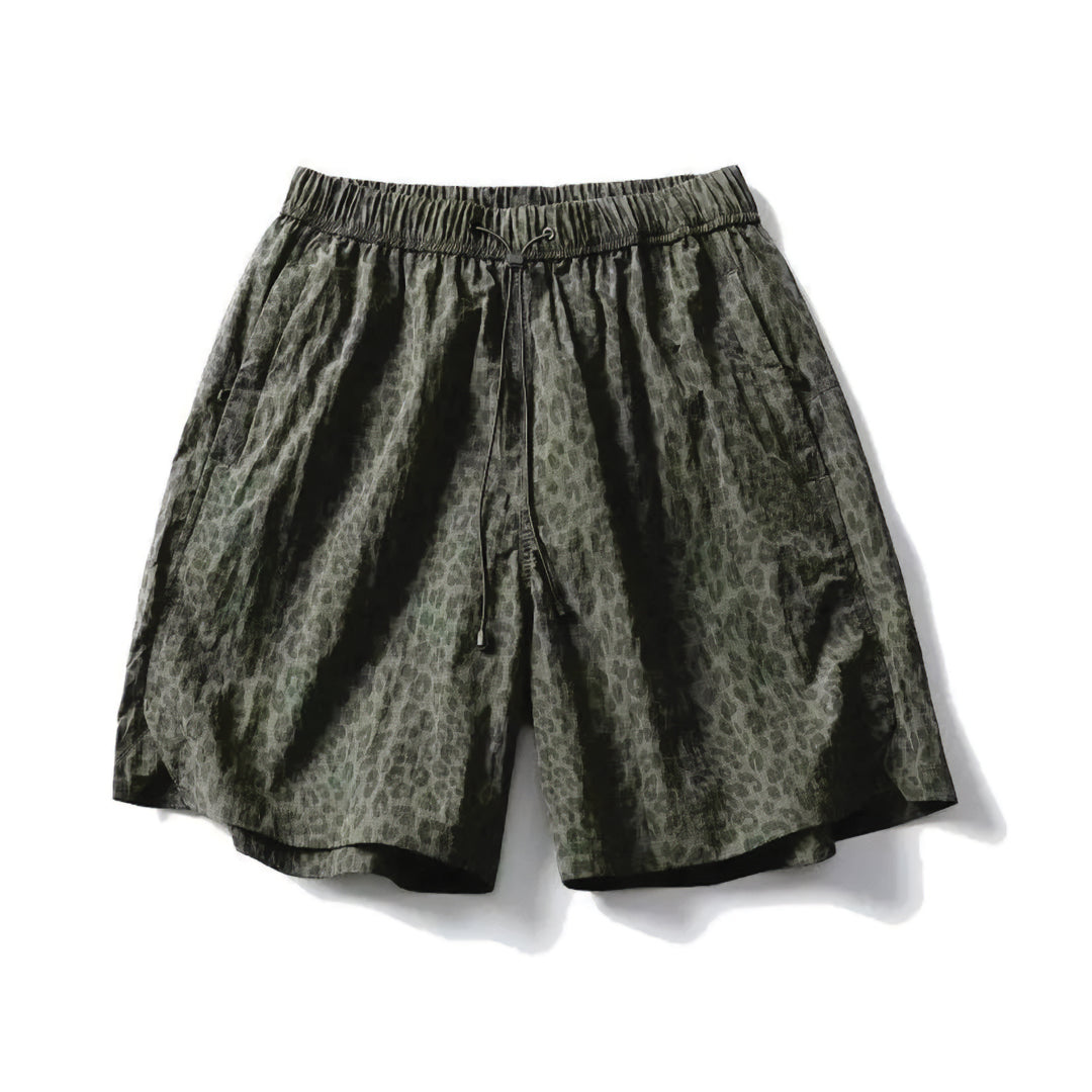 Leopard print quick-dry nylon shorts elastic drawstring waist bold animal pattern active outdoor style