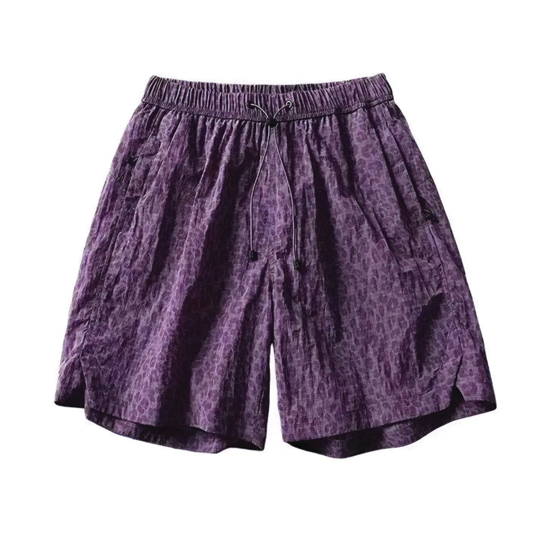 Leopard print quick-dry nylon shorts elastic drawstring waist bold animal pattern active outdoor style