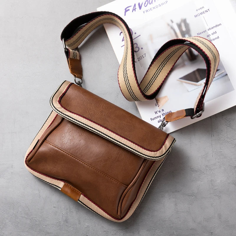 Men's structured striped sling bag with organized compartments for daily commutes and weekend outings