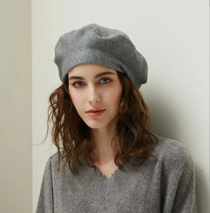 Women's slouchy rounded wool beret in soft neutral tone, relaxed silhouette with effortless casual chic style