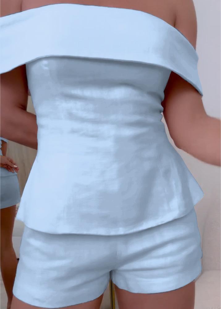 Women's white cotton blend two-piece suit with cropped button top and zipper closure tailored pants