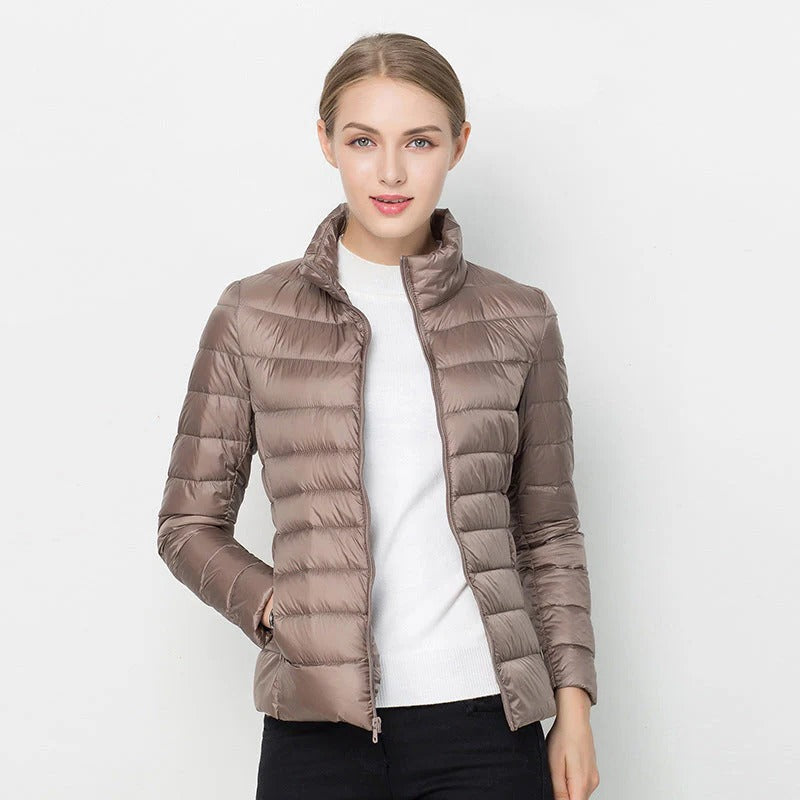 Women's lightweight down jacket regular fit short length packable design for easy movement