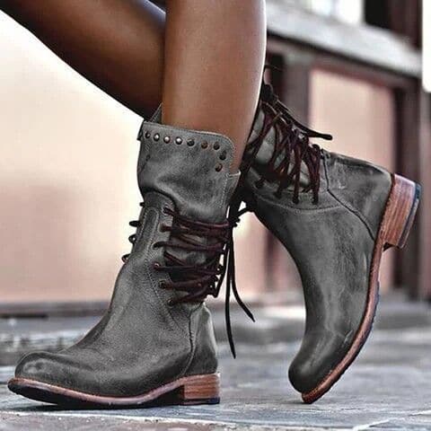 Women's black mid-height lace-up PU leather boots with bold stud detailing for everyday style