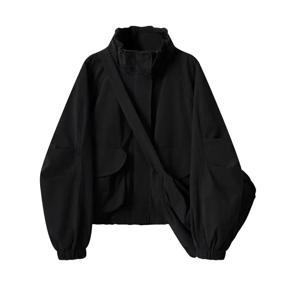 Women's loose fit retro windbreaker jacket in neutral tones, vintage workwear silhouette for autumn