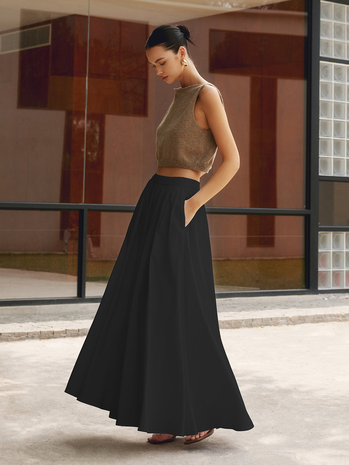 Women's linen blend pleated maxi skirt in neutral tone, flowy silhouette with breathable fabric