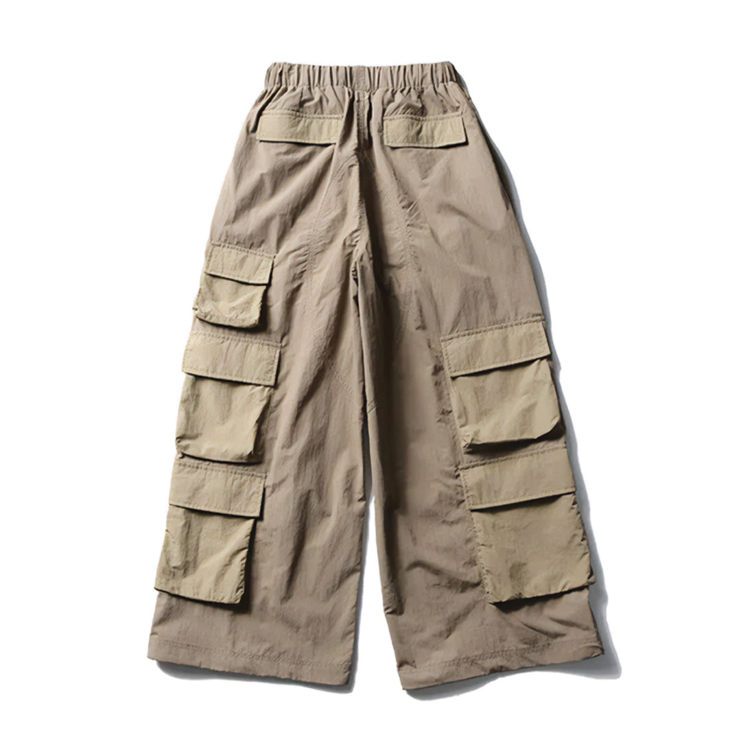 Striped wide-leg cargo pants with multi-pocket design, water-resistant nylon blend for travel