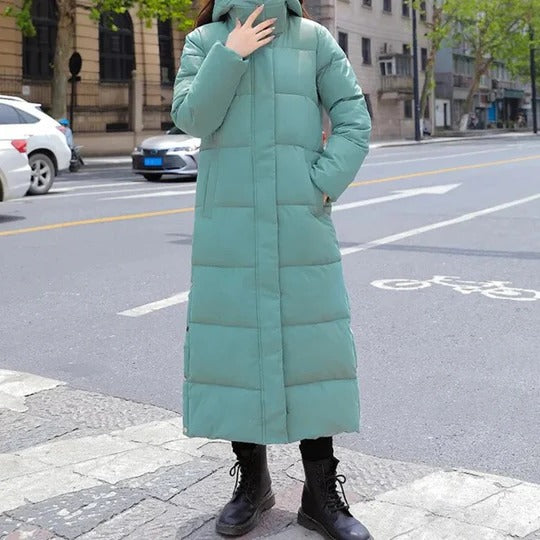 Women's long quilted hooded winter coat structured fit full-body coverage with side pockets