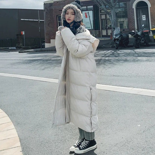 Women's full-length quilted winter coat, ultra-warm insulated construction with polished silhouette