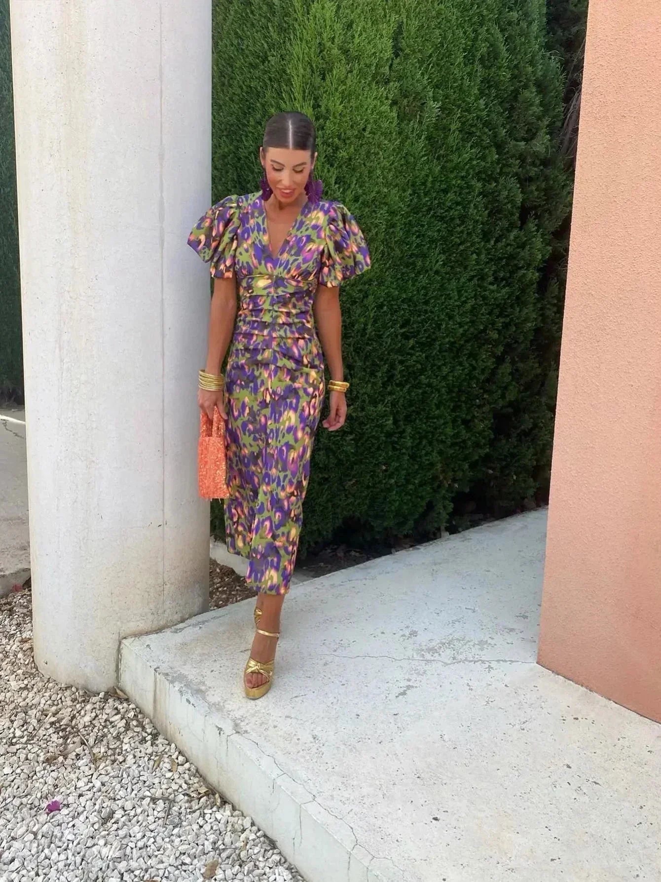 Vibrant puff sleeve bodycon midi dress for women with V-neck, bold color and playful print