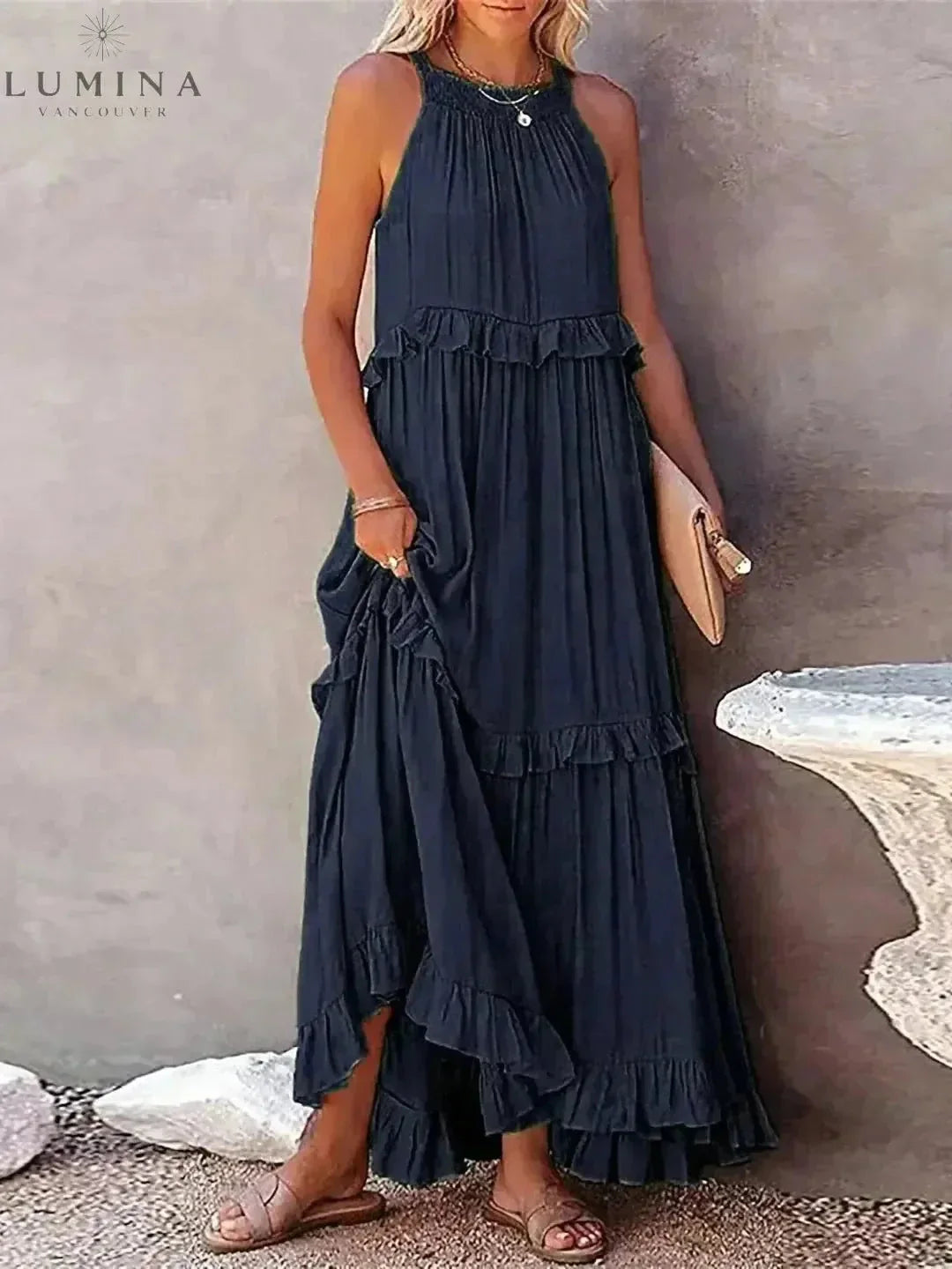Floral halterneck maxi dress with ruffles, adjustable back bow, pockets, relaxed fit summer style