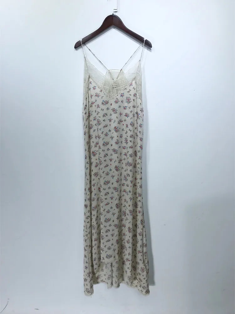 Ivory silk midi dress sleeveless V-neck silhouette with delicate lace embroidery detail