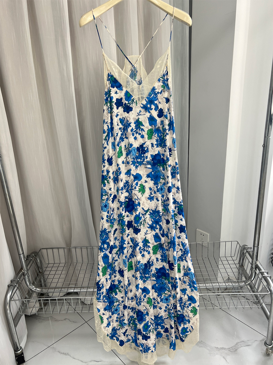 Ivory silk midi dress sleeveless V-neck with delicate lace embroidery flowing sophisticated silhouette