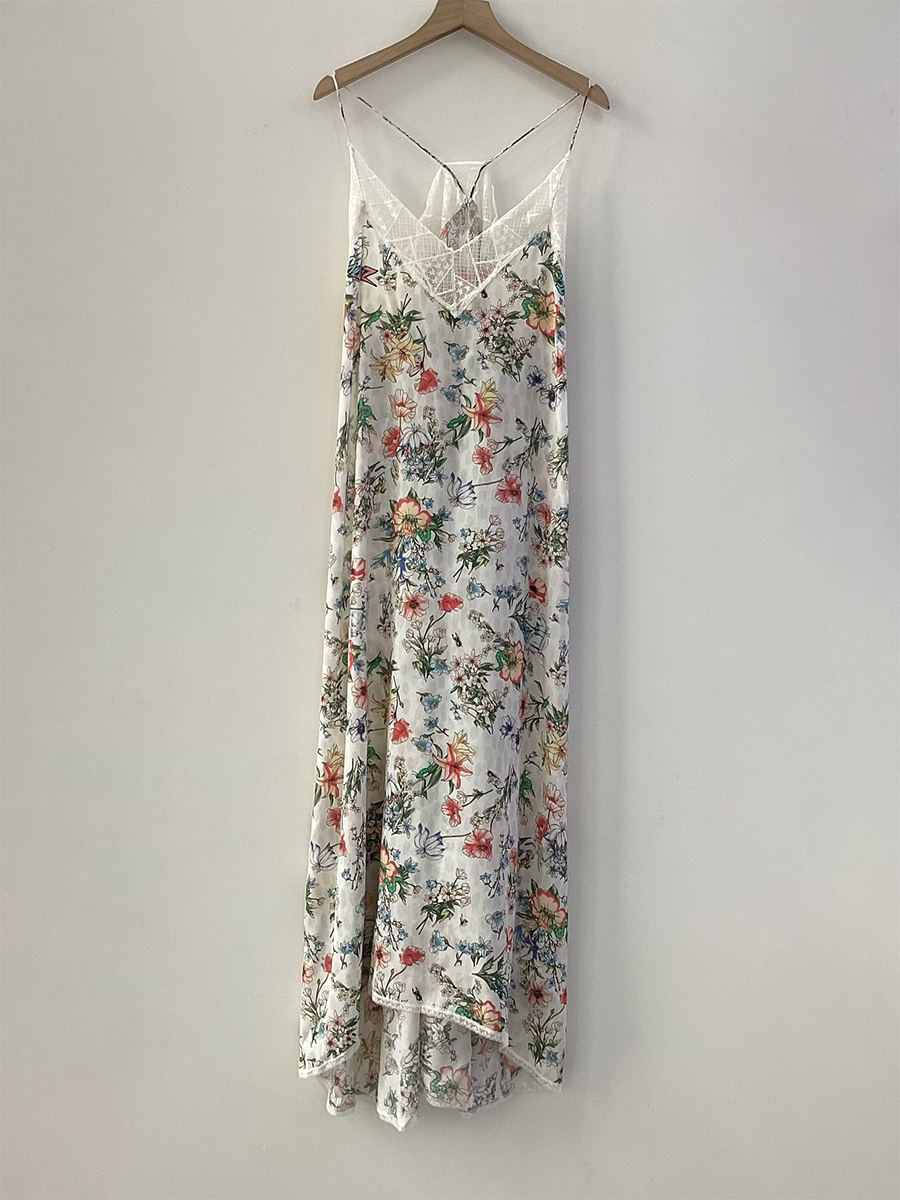 Ivory silk midi dress sleeveless V-neck with delicate lace embroidery flowing sophisticated silhouette